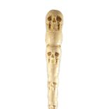 A unusual Inuit ‘skull’ carved walrus baculum, believed to be 19th century,Intricately carved and