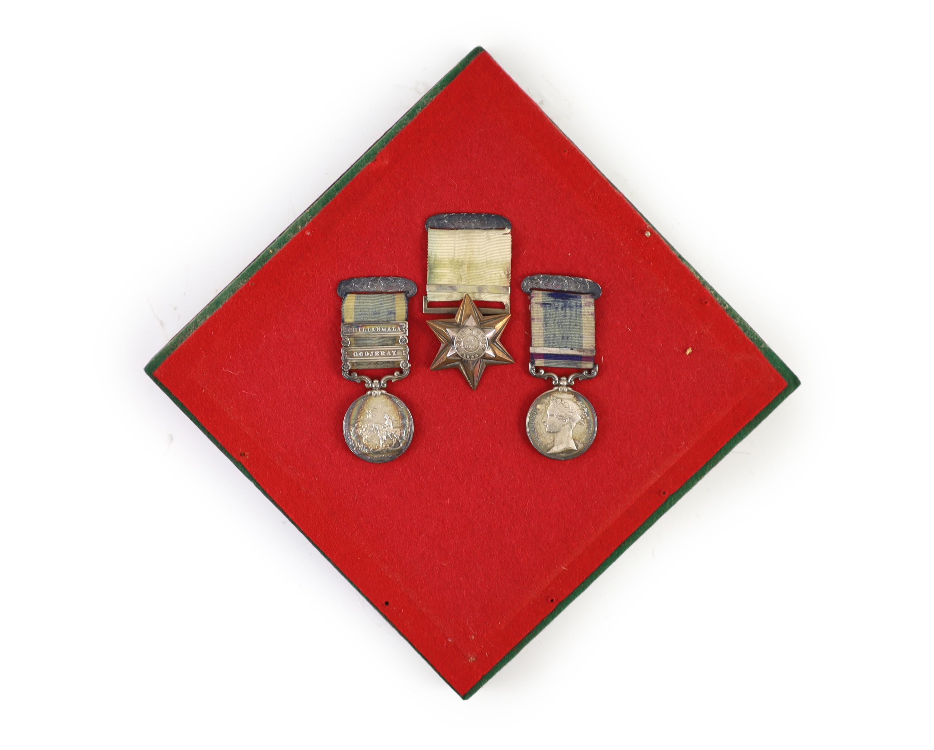 A Victorian Punjab Campaign medal group of three awarded to Corporal John Collett, Queen's Royal