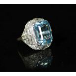 A 1930's/1940's platinum?, emerald cut aquamarine, round and baguette cut diamond set dress ring,