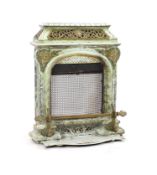 A late 19th century French Art Nouveau enamelled cast iron and brass fire surroundwith simulated