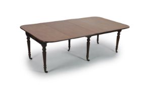 A Regency Morgan & Sanders Patent 'Imperial' mahogany extending dining table,with D shaped ends and