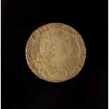 A George III gold guinea 1779, fourth laur. head r., rev. crowned shield of arms (S.3728), AVF