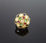 A continental gold (stamped 850) and multi gem set circular dress ring,set with diamonds, rubies,