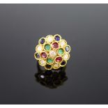 A continental gold (stamped 850) and multi gem set circular dress ring,set with diamonds, rubies,