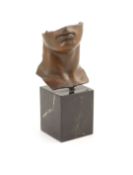 § Igor Mitoraj (1944-2014), bronze patinated sculpture, Half study of a man's facesigned, on marble