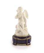 A Sevres biscuit porcelain figure of a cherub, c.1882-4,on a bleu royale plinth inscribed in gilt ‘