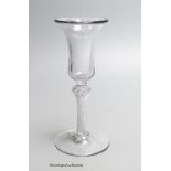 A Georgian air twist stem wine glass c.1750, a bell shaped bowl.17cm