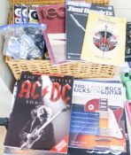 A quantity of guitar instructional books and magazines and plectrums, tuners etc