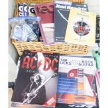 A quantity of guitar instructional books and magazines and plectrums, tuners etc