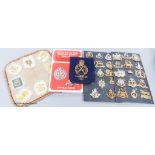 A collection of Military cap badges