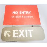 A 20th century 'exit' and 'No Entry Rehearsal in Progress' sign