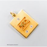 A yellow metal and three stone diamond set "YPO" initialled pendant, 20mm, gross 7.5 grams.