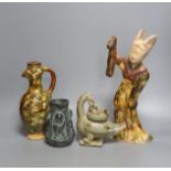 A Chinese Tang style sancai figure of a lady, a similar phoenix head ewer, a Yue type oil lamp and