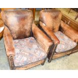 A pair of tan leather upholstered armchairs, width 70cm, depth 80cm, height 85cm