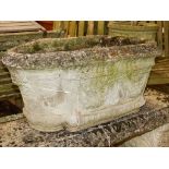 A pair of reconstituted stone shaped oval planters with swag decoration, width 80cm, height 42cm