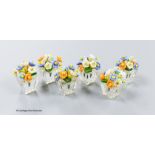 A boxed set of six Czechoslovakian glass flower menu holders, height 3.5cm