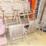 A weathered teak extending garden table, 204cm extended, length 108cm, height 76cm together with