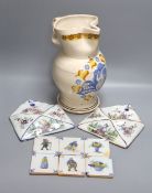 A pair of Delft wall brackets, a set of six delft small tiles and a large maiolica pitcher, height