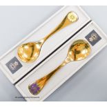 Two boxed Georg Jensen gilt sterling and enamel year spoons, 1973 & 1974 (Corn Marigold and Corn