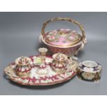 A 19th century English porcelain inkstand, a basket and associated cover and a Spode base, tallest