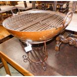 A cast iron fire pit with grill, diameter 67cm, height 65cm