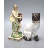 A pearlware figure of a lady, c.1800, with a harp together with a German porcelain figure of a