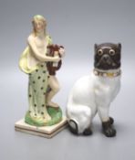 A pearlware figure of a lady, c.1800, with a harp together with a German porcelain figure of a