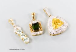 Three assorted modern 18ct gold and gem set pendants, including sphalerite and diamond, overall