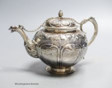A late 18th/early 19th century Swedish? embossed white metal teapot, 13.5cm, gross 11.5oz