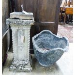 A copper sundial on reconstituted stone plinth, height 73cm together with a circular cast lead