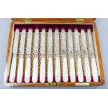 A cased set of twelve pairs of late Victorian mother of pearl handled silver dessert eaters, Z.