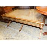 An Italian style gilt and glass 'X' frame coffee table fitted end drawers, length 132cm, depth