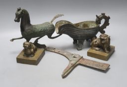 A group of Chinese archaistic bronzes, to include a pouring vessel, two ‘mythical beast seals’, a