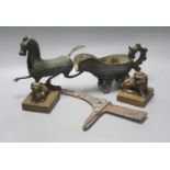 A group of Chinese archaistic bronzes, to include a pouring vessel, two ‘mythical beast seals’, a