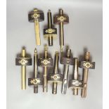 A collection of mahogany and ebony and brass marking gauges, longest 25cm