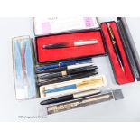 An assortment of fountain pens and ball point pens