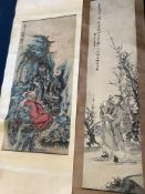 Two Chinese scroll paintings on paper, 20th century, depicting a Luohan in a cave and a scholar