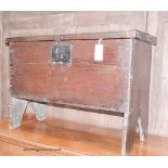 A 17th century oak six-plank coffer of small proportions,the interior with candle box, length 76cm,