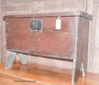 A 17th century oak six-plank coffer of small proportions,the interior with candle box, length 76cm,