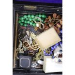 A quantity of assorted costume jewellery including a faux amber necklace etc.