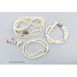 A long single strand graduated cultured pearl necklace, with marcasite clasp, 90cm, one other