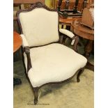 A Victorian carved mahogany armchair, width 70cm, depth 60cm, height 98cm