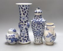 Two 19th century Chinese blue and white vases, an 18th Century blue and white jug and a later jar