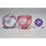 Two Jane Charles art glass disc panels and a pink art glass bowl, tallest 15.5cm