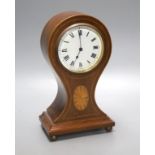 An Edwardian inlaid mahogany balloon cased timepiece, height 24cm