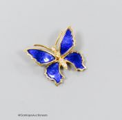 A modern 18ct gold, blue enamel and diamond set butterfly brooch, 22mm, gross weight 5.7 grams.