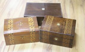 A Victorian rosewood writing box and two Victorian walnut and parquetry boxes