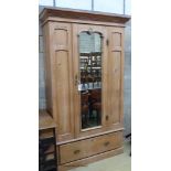 A Victorian pine mirrored door wardrobe, length 119cm, depth 48cm, height 206cm