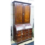 A George III mahogany bureau cabinet, width 102cm, depth 56cm, height 222cm