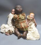 A black bisque-headed doll, German KB-M 5 bent limb with a smaller German bisque open mouth kid